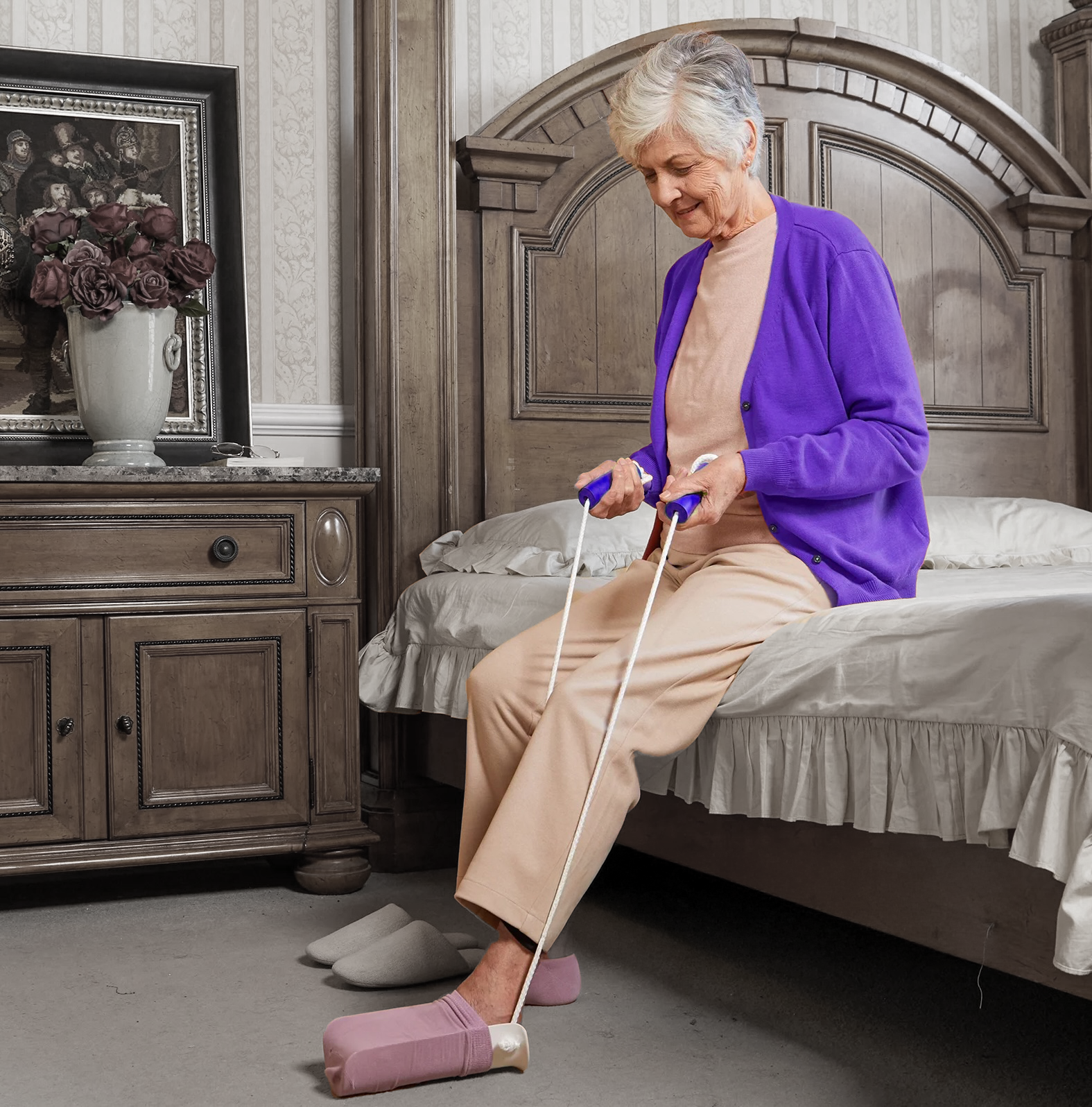 AvoEase compression sock aid with medical-grade plastic shell, foam handles, and adjustable cords for independent compression garment application
